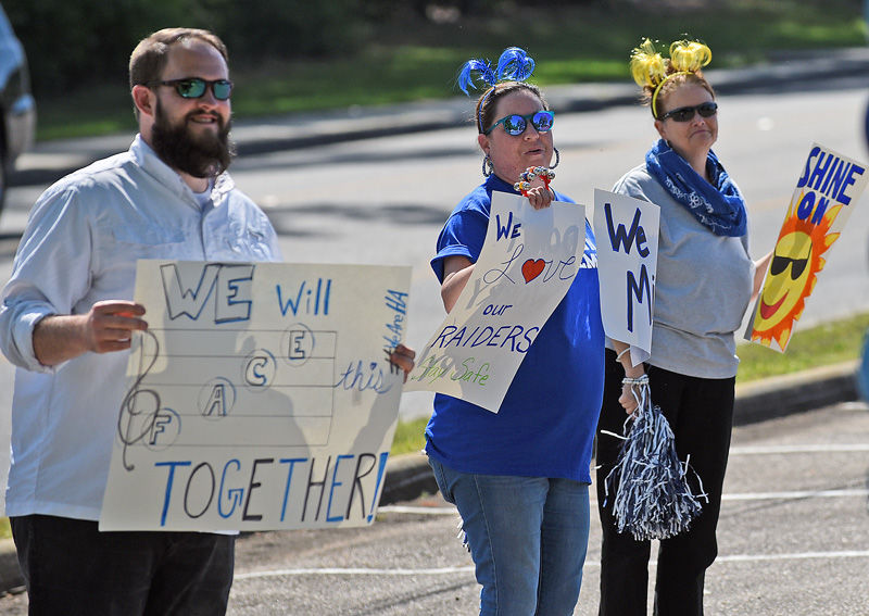 Teachers hold parade for students at Houston Academy